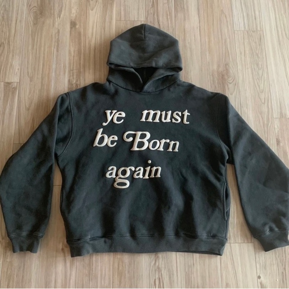 Cactus Plant Flea Market Born Again Hooded Sweatshirt
Core/Coal